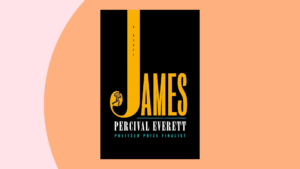 The Cover of "James" by Percival Everett atop a peach and pale orange background